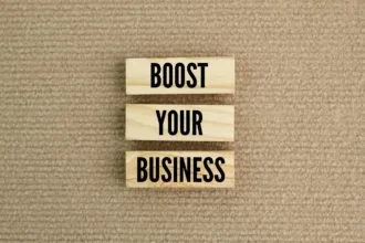 sticks arranged with the words boost your business.